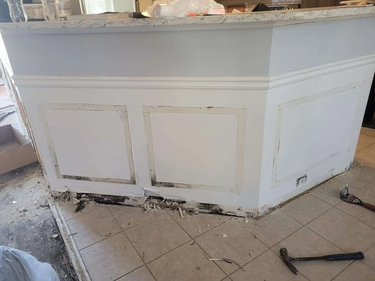 Water damage and mold on kitchen during Storm Damage Restoration in Holdenville